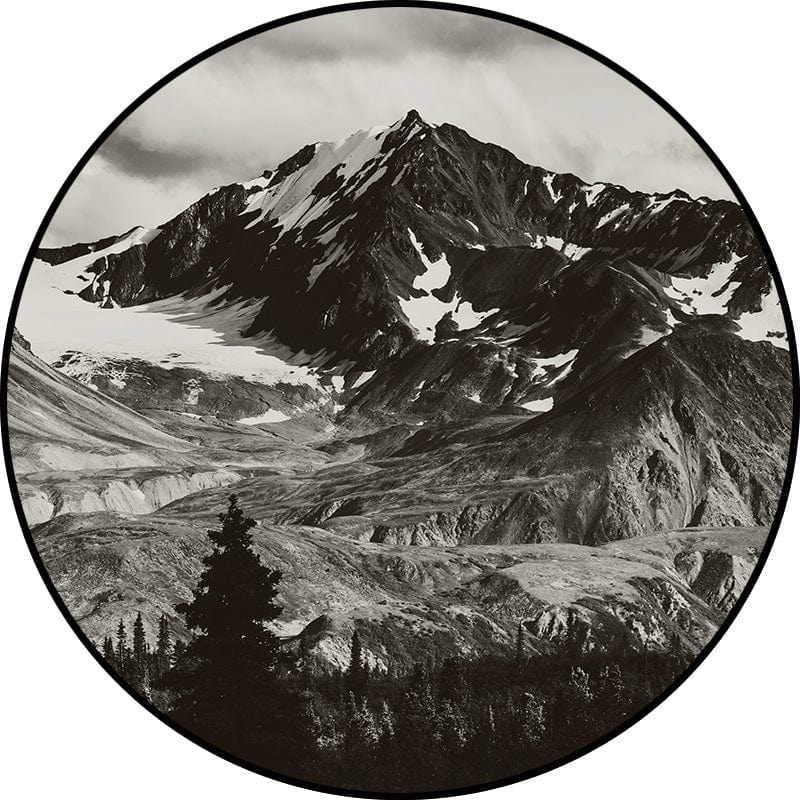 Black and white mountain landscape in a circle