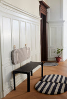 KANALGESIENNA bench and rugs in hallway