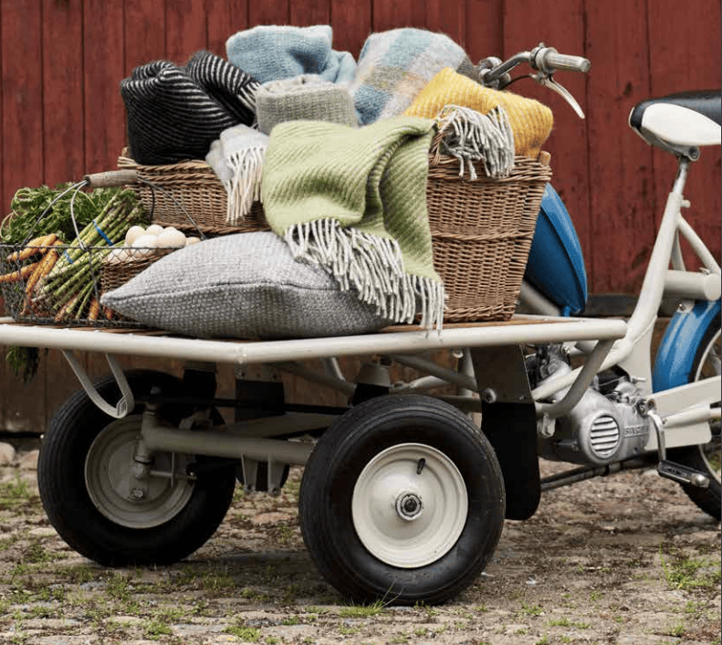 KLIPPAN blankets and pillows on vintage cargo bike