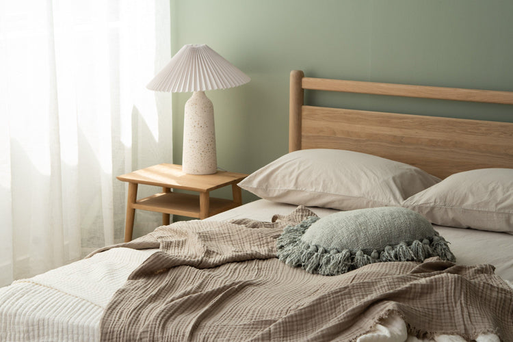 Bedroom with pleated lamp and bed linens (KTA010OKV0037O_3)