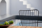 Black chair by pool