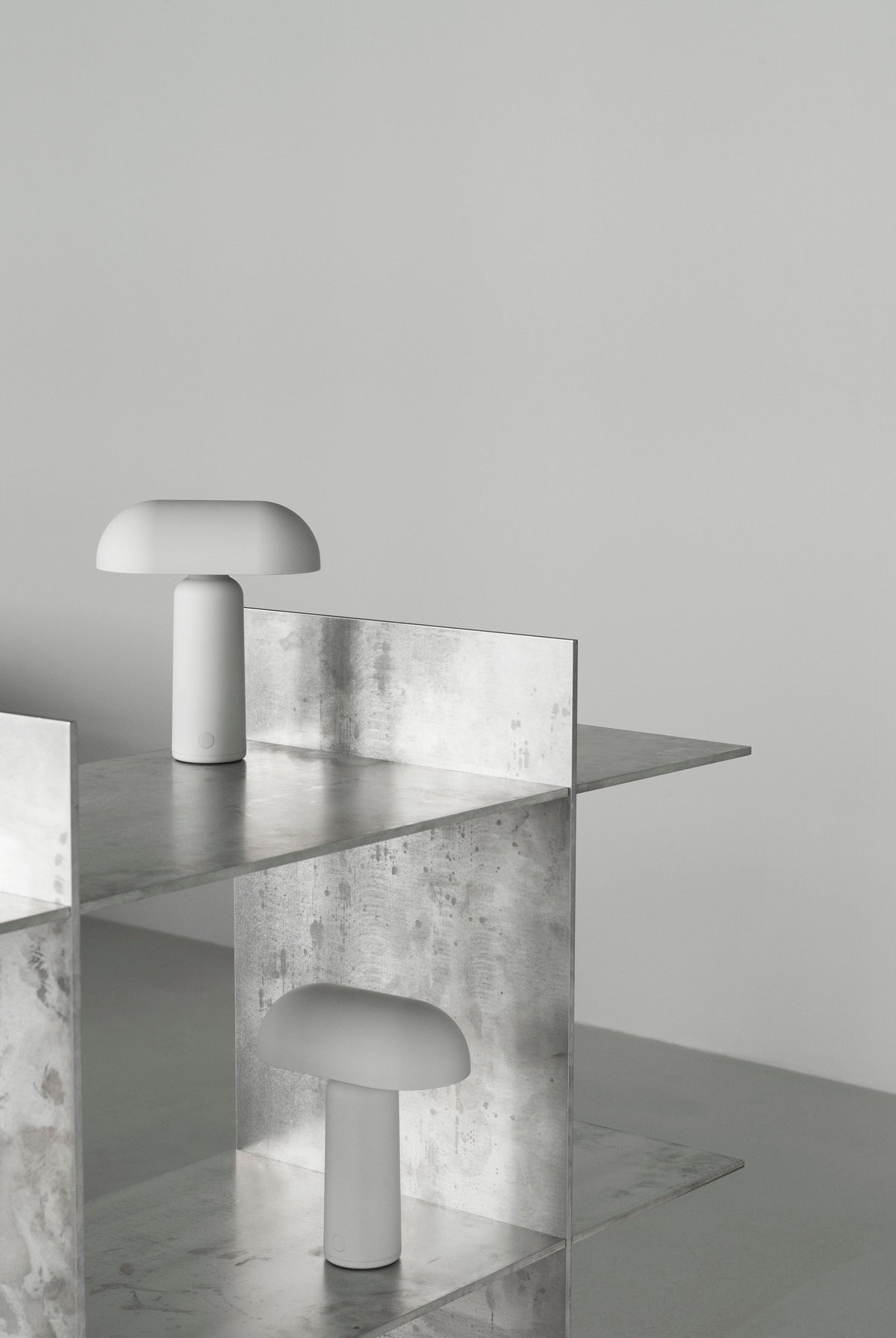 Modern white mushroom lamps on metal shelves