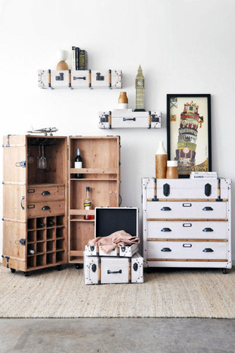Trunk-style furniture set with shelves and bar cabinet.